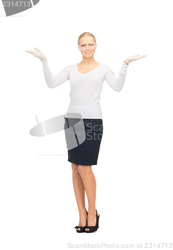 Image of woman in protective glasses and gloves
