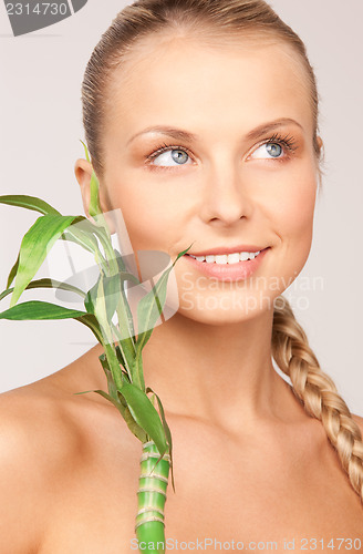 Image of woman with sprout