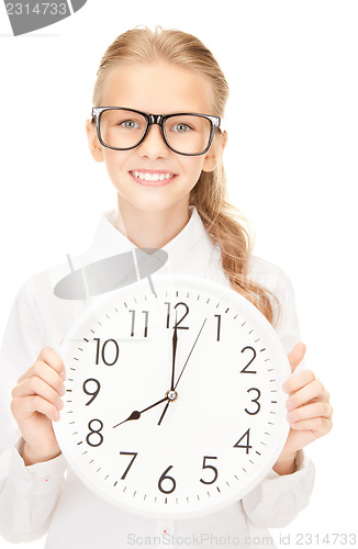 Image of girl holding big clock