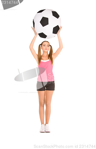 Image of lovely woman with big soccer ball