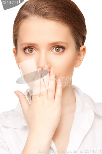 Image of hand over mouth