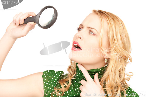 Image of woman with magnifying glass