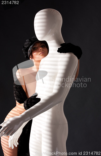 Image of woman with mannequin