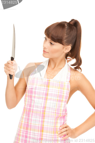 Image of housewife with big knife 