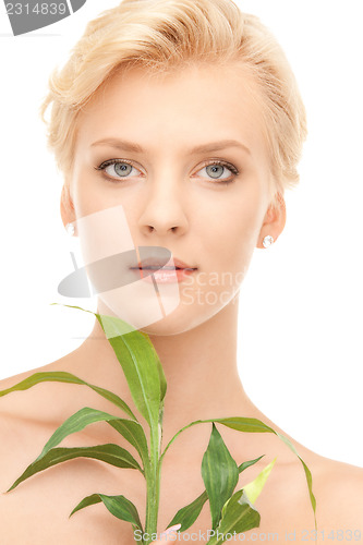 Image of woman with sprout