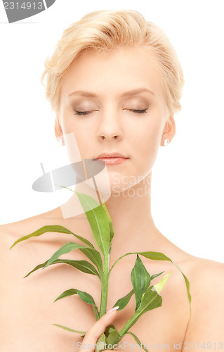 Image of woman with sprout