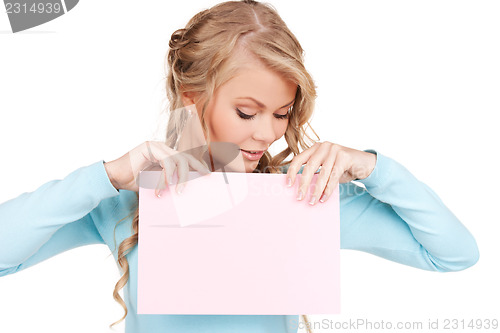 Image of happy woman with blank board
