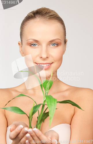 Image of woman with sprout