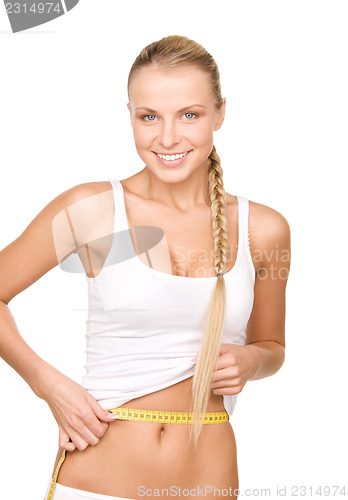 Image of beautiful woman with measure tape