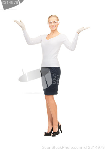 Image of woman in protective glasses and gloves
