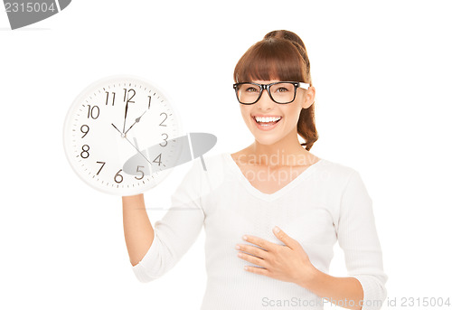 Image of woman holding big clock
