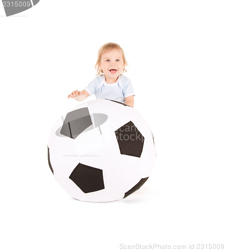 Image of baby boy with soccer ball