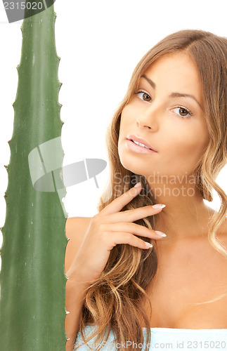 Image of lovely woman with aloe vera