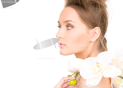 Image of beautiful woman with white flower
