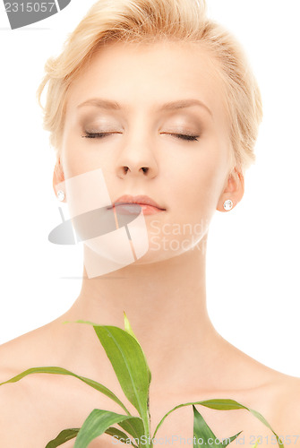 Image of woman with sprout