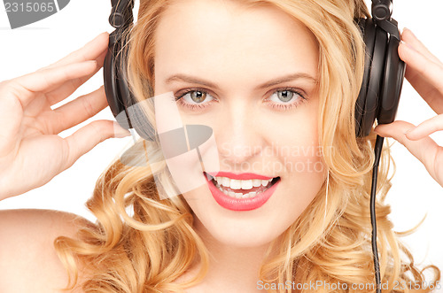 Image of happy woman in headphones