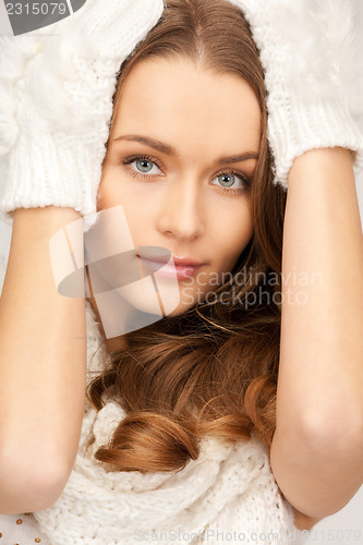 Image of beautiful woman in white gloves