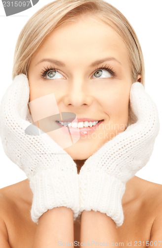 Image of beautiful woman in white mittens 