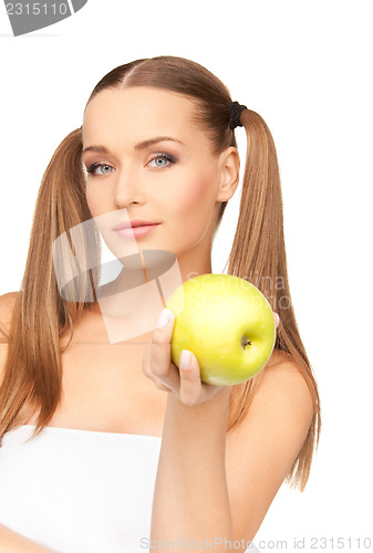 Image of young beautiful woman with green apple