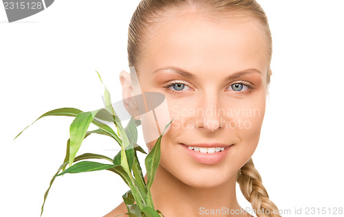 Image of woman with sprout