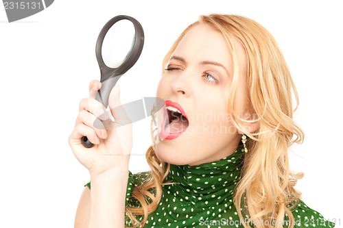 Image of woman with magnifying glass