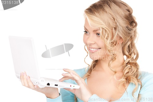 Image of happy woman with laptop computer