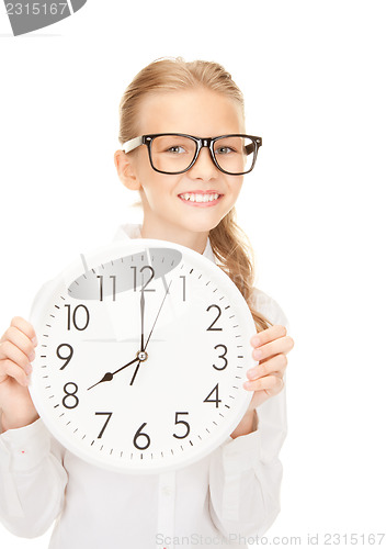 Image of girl holding big clock