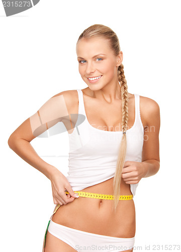 Image of beautiful woman with measure tape