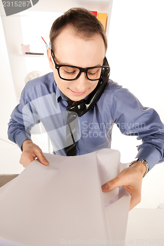 Image of funny picture of businessman in office