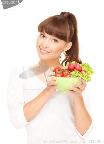 Image of beautiful housewife with vegetables