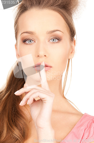 Image of finger on lips