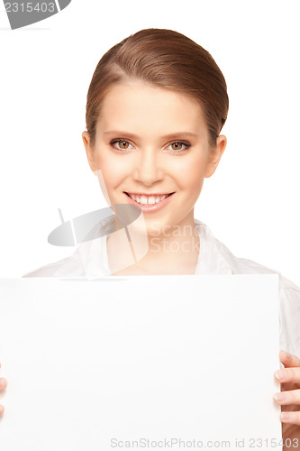 Image of happy teenage girl with blank board