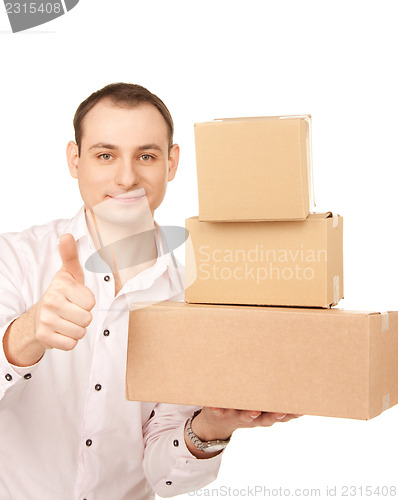 Image of businessman with parcels