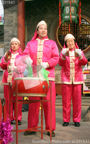 Image of Chinese New Year celebrations in Qingdao, China - performer at a