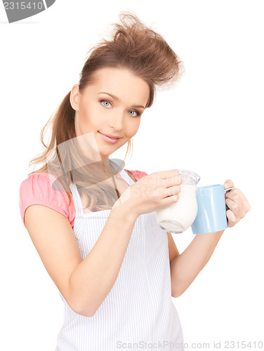 Image of housewife with milk and mug