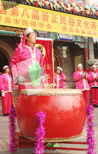 Image of Chinese New Year celebrations in Qingdao, China - performer at a