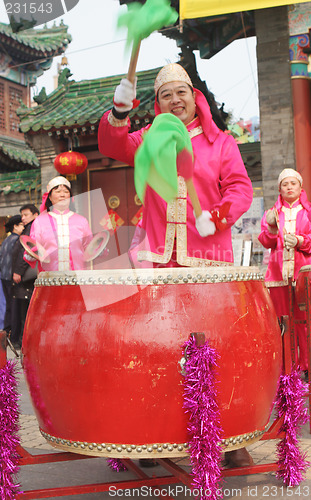 Image of Chinese New Year celebrations in Qingdao, China - performer at a