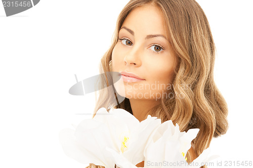 Image of beautiful woman with white flower