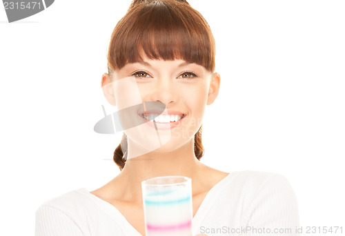 Image of lovely woman with glass of milk