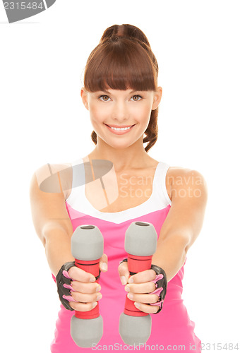 Image of fitness instructor with dumbbells