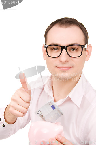 Image of businessman with piggy bank and money