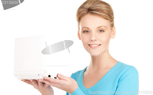 Image of happy woman with laptop computer