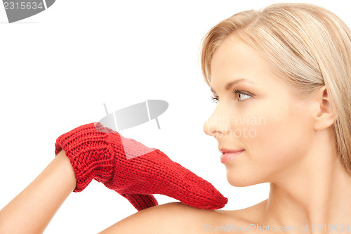 Image of beautiful woman in red mittens 