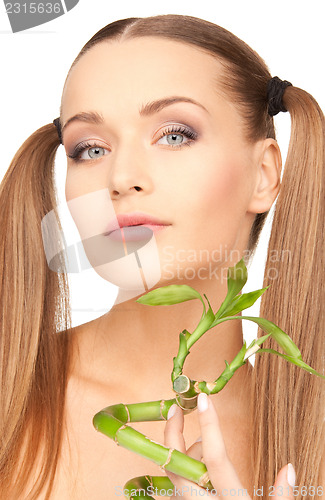 Image of woman with sprout