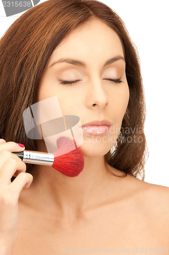 Image of lovely woman with brush