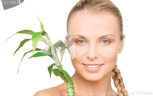 Image of woman with sprout