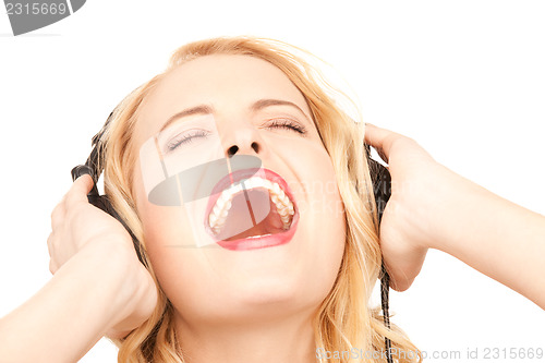 Image of happy woman in headphones