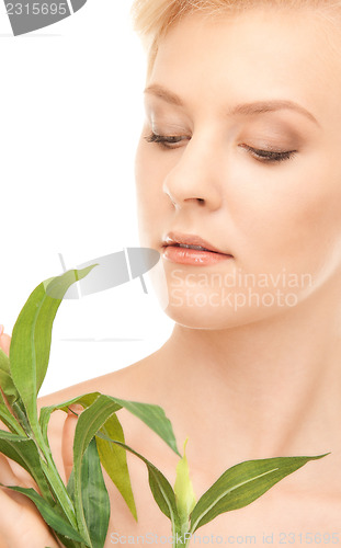 Image of woman with sprout