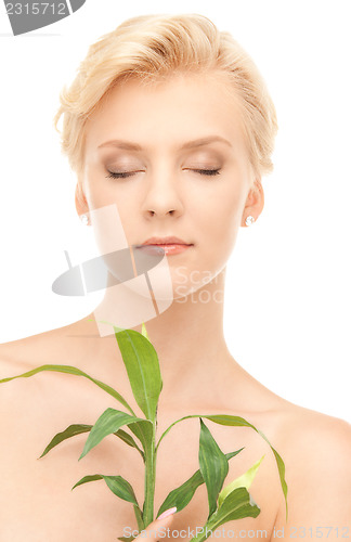 Image of woman with sprout