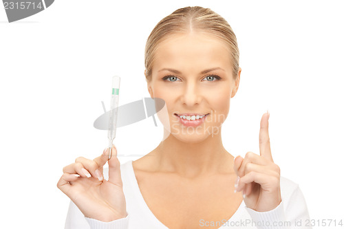 Image of attractive female doctor with thermometer